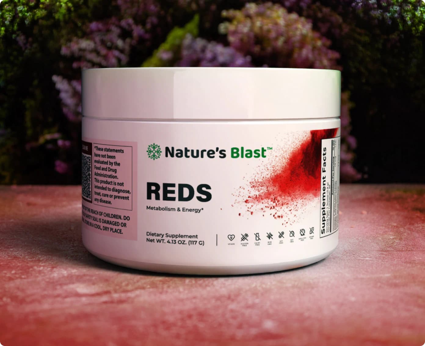 Nature's Blast one of the best superfood supplements Reds jar on pink textured background