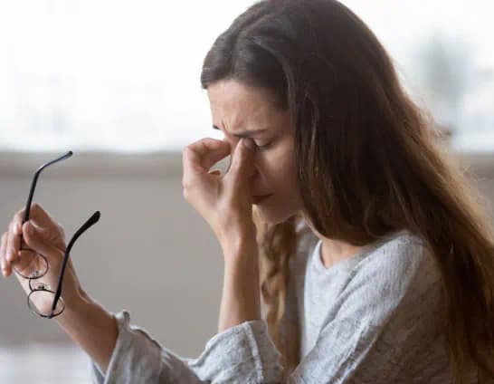 Woman with tired eyes